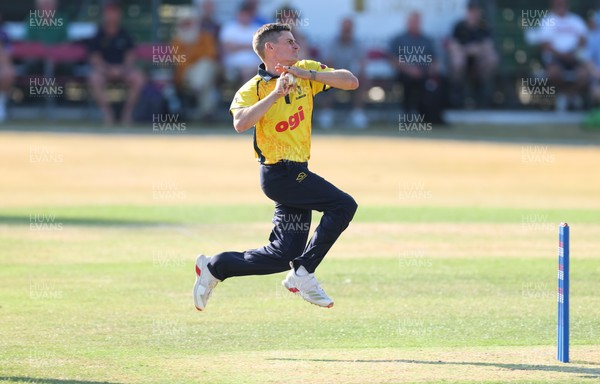 220726 - Glamorgan v Sussex Sharks, Metro Bank One Day Cup - Andy Gorvin of Glamorgan bowls