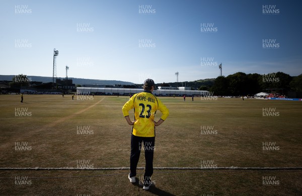 220726 - Glamorgan v Sussex Sharks, Metro Bank One Day Cup - Jack Hope-Bell of Glamorgan fields on the boundary in the final overs of the match