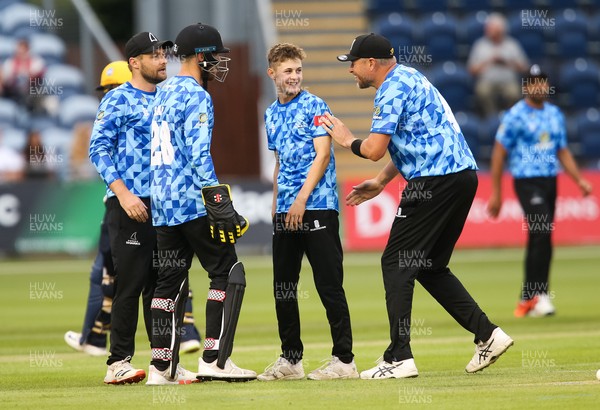 020721 - Glamorgan v Sussex Sharks, T20 Vitality Blast - Archie Lenham of Sussex Sharks is congratulated by team mates after Chris Cooke of Glamorgan is caught out by Phil Salt of Sussex Sharks off his bowling