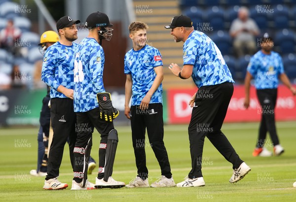 020721 - Glamorgan v Sussex Sharks, T20 Vitality Blast - Archie Lenham of Sussex Sharks is congratulated by team mates after Chris Cooke of Glamorgan is caught out by Phil Salt of Sussex Sharks off his bowling