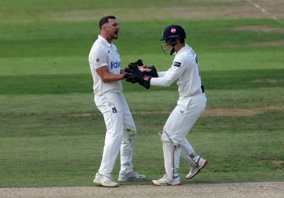 090926 - Glamorgan v Warwickshire - Rothesay County Championship, Division One - Ed Barnard of Warwickshire celebrates taking the wicket of Asa Tribe for LBW