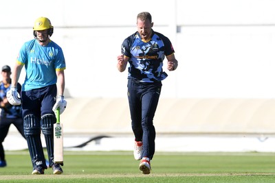030726 - Glamorgan v Warwickshire Bears - Vitality Blast Men - Nathan McAndrew of Glamorgan bowls the ball to dismiss Zen Malik of Warwickshire Bears