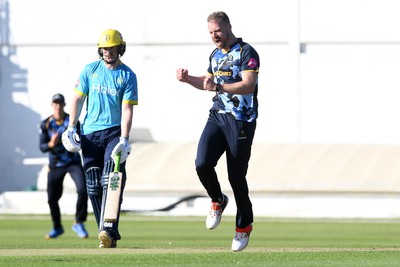 030726 - Glamorgan v Warwickshire Bears - Vitality Blast Men - Nathan McAndrew of Glamorgan bowls the ball to dismiss Zen Malik of Warwickshire Bears