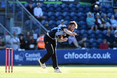 030726 - Glamorgan v Warwickshire Bears - Vitality Blast Men - Jimmy Neesham of Glamorgan bowls the ball to dismiss Dan Mousley of Warwickshire Bears