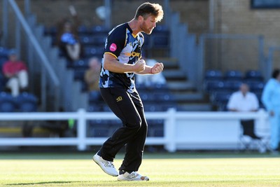 030726 - Glamorgan v Warwickshire Bears - Vitality Blast Men - Jimmy Neesham of Glamorgan bowls the ball to dismiss Dan Mousley of Warwickshire Bears