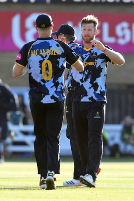 030726 - Glamorgan v Warwickshire Bears - Vitality Blast Men - Jimmy Neesham of Glamorgan bowls the ball to dismiss Dan Mousley of Warwickshire Bears
