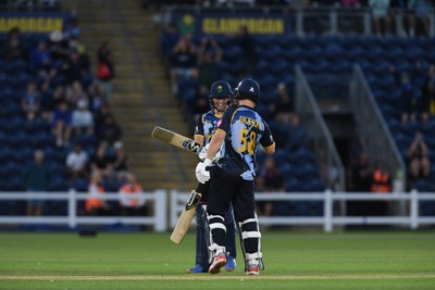 030726 - Glamorgan v Warwickshire Bears - Vitality Blast Men - Sean Dickson of Glamorgan celebrates with Asa Tribe of Glamorgan after hitting a 6