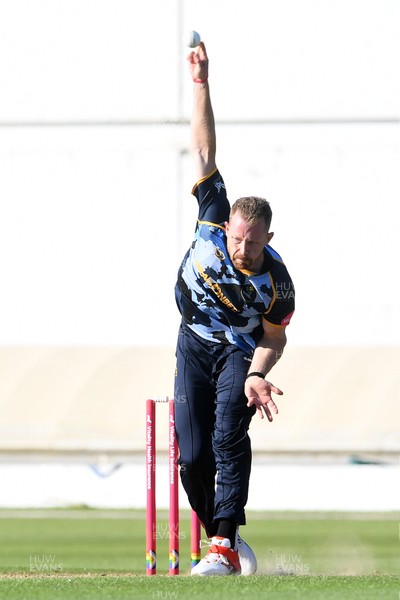 030726 - Glamorgan v Warwickshire Bears - Vitality Blast Men - Nathan McAndrew of Glamorgan bowls the ball to dismiss Zen Malik of Warwickshire Bears