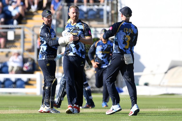 030726 - Glamorgan v Warwickshire Bears - Vitality Blast Men - Nathan McAndrew of Glamorgan bowls the ball to dismiss Zen Malik of Warwickshire Bears