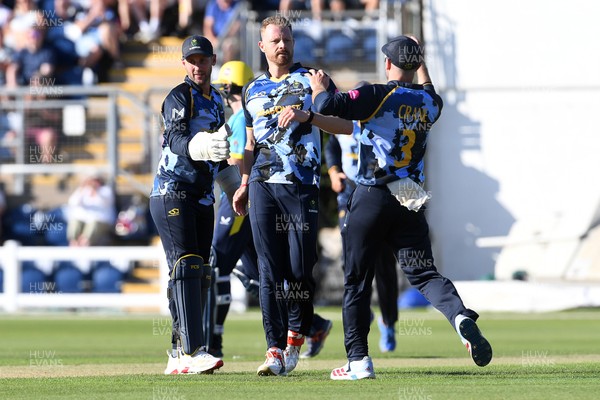 030726 - Glamorgan v Warwickshire Bears - Vitality Blast Men - Nathan McAndrew of Glamorgan bowls the ball to dismiss Zen Malik of Warwickshire Bears