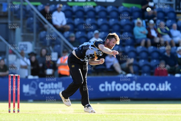 030726 - Glamorgan v Warwickshire Bears - Vitality Blast Men - Jimmy Neesham of Glamorgan bowls the ball to dismiss Dan Mousley of Warwickshire Bears