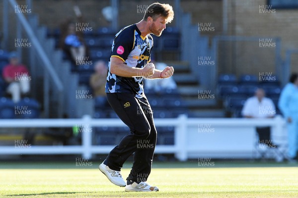 030726 - Glamorgan v Warwickshire Bears - Vitality Blast Men - Jimmy Neesham of Glamorgan bowls the ball to dismiss Dan Mousley of Warwickshire Bears