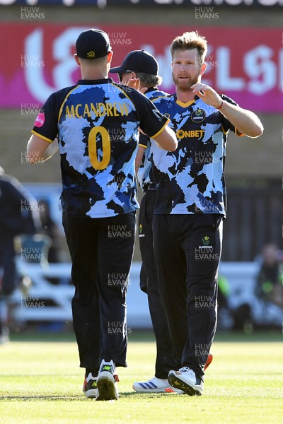030726 - Glamorgan v Warwickshire Bears - Vitality Blast Men - Jimmy Neesham of Glamorgan bowls the ball to dismiss Dan Mousley of Warwickshire Bears
