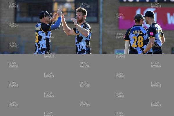 030726 - Glamorgan v Warwickshire Bears - Vitality Blast Men - Jimmy Neesham of Glamorgan bowls the ball to dismiss Dan Mousley of Warwickshire Bears