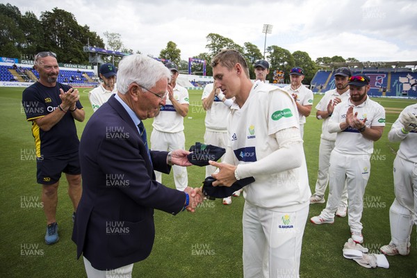 020719 - Glamorgan v Worcestershire - Specsavers County Championship Division Two - Marnus Labuschagne of Glamorgan receives his Glamorgan cap from President Alan Jones