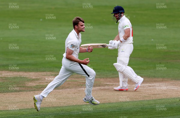 060922 - Glamorgan v Worcestershire - LV= County Championship, Division Two - Ben Gibbon celebrates after David Lloyd of Glamorgan is caught by Jack Haynes