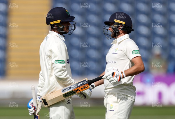 070922 - Glamorgan v Worcestershire - LV= County Championship, Division Two - Shubman Gill acknowledges his half century with Billy Root of Glamorgan