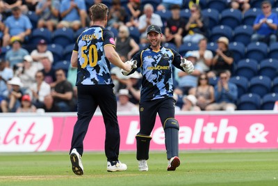 050726 - Glamorgan v Worcestershire Rapids - Vitality Blast Men - Jimmy Neesham of Glamorgan bowls the ball to dismiss Gareth Roderick of Worcestershire