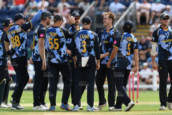 050726 - Glamorgan v Worcestershire Rapids - Vitality Blast Men - Ben Kellaway of Glamorgan bowls the ball to dismiss Isaac Mohammed of Worcestershire