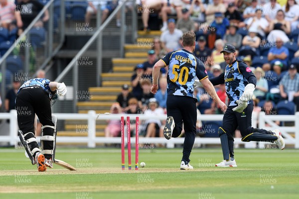 050726 - Glamorgan v Worcestershire Rapids - Vitality Blast Men - Jimmy Neesham of Glamorgan kicks the ball at the wicket in an attempt to get Matthew Waite of Worcestershire out