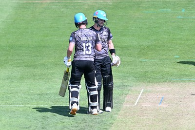 090826 - Glamorgan v Worcestershire Rapids - Metro Bank One Day Cup Men - Jake Libby of Worcestershire is congratulated by team mate Henry Cullen after he hits 50