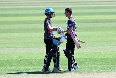 090826 - Glamorgan v Worcestershire Rapids - Metro Bank One Day Cup Men - Jake Libby of Worcestershire celebrates with Henry Cullen after getting his century