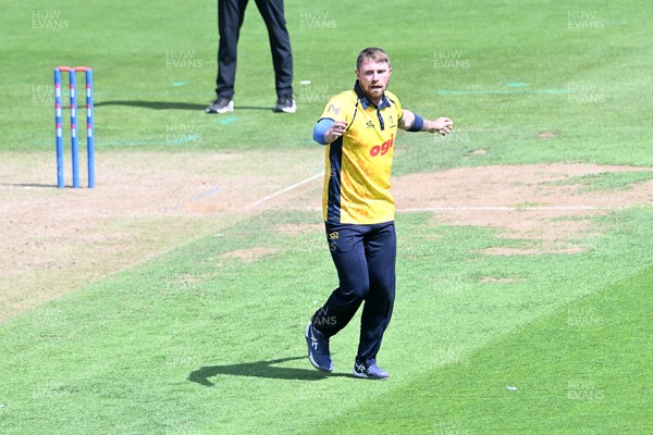 090826 - Glamorgan v Worcestershire Rapids - Metro Bank One Day Cup Men - Dan Douthwaite of Glamorgan bowls the ball to dismiss Kashif Ali of Worcestershire