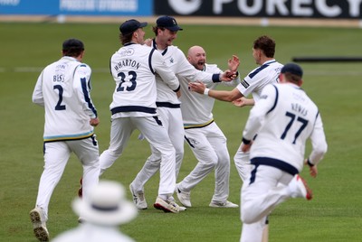 030426 - Glamorgan v Yorkshire - Rothesay County Championship Division One - Finlay Bean of Yorkshire celebrates with team mates after Eddie Byrom was caught by Ben Coad