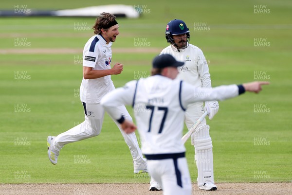 030426 - Glamorgan v Yorkshire - Rothesay County Championship Division One - Jack White of Yorkshire celebrates with team mates after Kiran Carlson is dismissed
