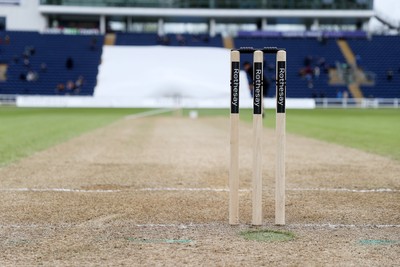 040426 - Glamorgan v Yorkshire - Rothesay County Championship Division One - Ground staff prepare the wicket at tea