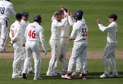 050426 - Glamorgan v Yorkshire - Rothesay County Championship Division One - Mason Crane of Glamorgan celebrates taking the wicket of George Hill of Yorkshire