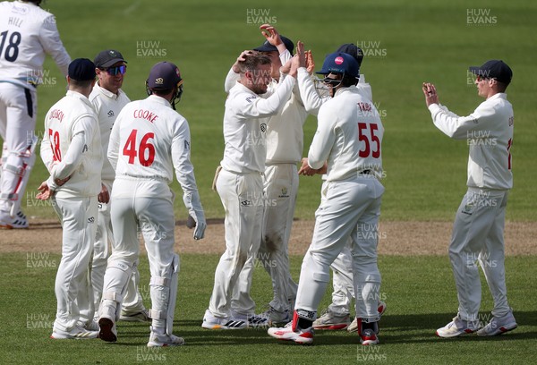 050426 - Glamorgan v Yorkshire - Rothesay County Championship Division One - Mason Crane of Glamorgan celebrates taking the wicket of George Hill of Yorkshire