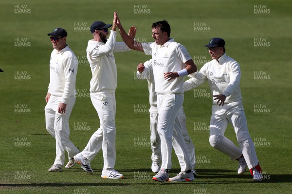 050426 - Glamorgan v Yorkshire - Rothesay County Championship Division One - Ryan Hadley of Glamorgan celebrates taking the wicket of Logan van Beek with team mates