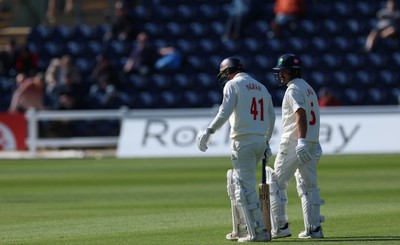 060426 - Glamorgan v Yorkshire, Rothesay County Championship, Division One - Colin Ingram of Glamorgan and Kiran Carlson of Glamorgan resume their partnership
