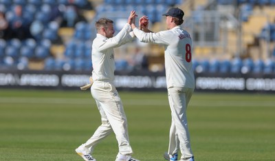 060426 - Glamorgan v Yorkshire, Rothesay County Championship, Division One - Mason Crane of Glamorgan and Ben Kellaway of Glamorgan celebrate after they combine to bowl and catch Sam Whiteman of Yorkshire