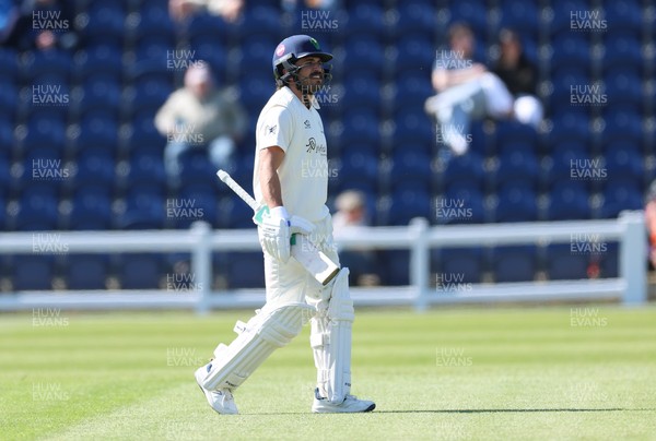 060426 - Glamorgan v Yorkshire, Rothesay County Championship, Division One - Kiran Carlson of Glamorgan returns to the pavilion after being dismissed
