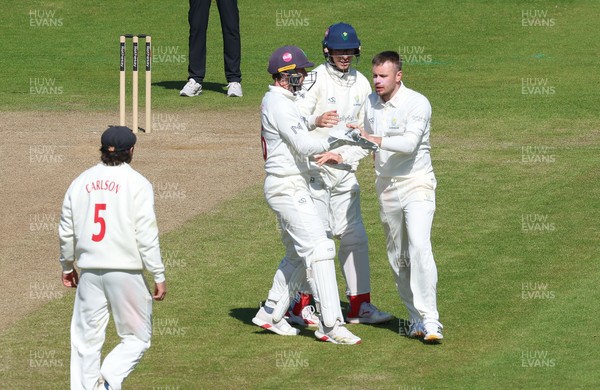 060426 - Glamorgan v Yorkshire, Rothesay County Championship, Division One - Mason Crane of Glamorgan celebrates with team mates as he takes the wicket of as Finlay Bean of Yorkshire lbw