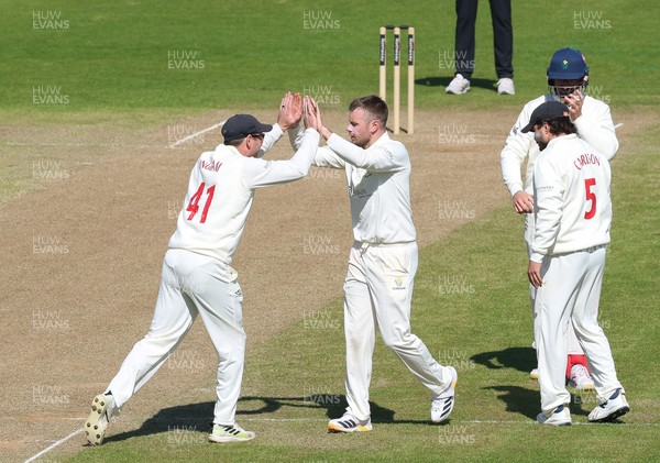 060426 - Glamorgan v Yorkshire, Rothesay County Championship, Division One - Mason Crane of Glamorgan celebrates with team mates as he takes the wicket of as Finlay Bean of Yorkshire lbw