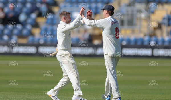 060426 - Glamorgan v Yorkshire, Rothesay County Championship, Division One - Mason Crane of Glamorgan and Ben Kellaway of Glamorgan celebrate after they combine to bowl and catch Sam Whiteman of Yorkshire