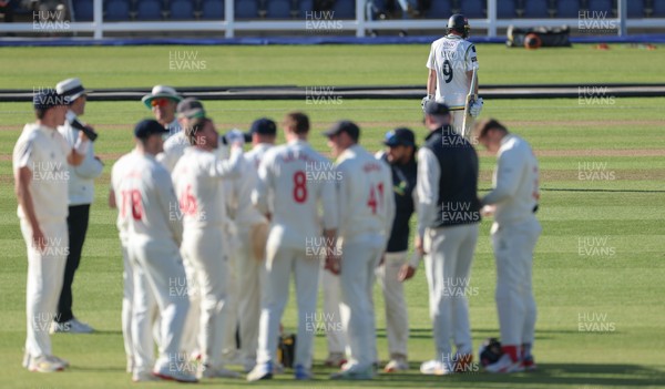 060426 - Glamorgan v Yorkshire, Rothesay County Championship, Division One - Adam Lyth of Yorkshire makes his wayy to the pavilion after he is caught by Chris Cooke of Glamorgan off the bowling of Ben Kellaway for 97