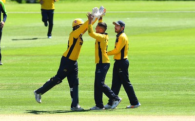 100822 - Glamorgan v Yorkshire - Royal London One-Day Cup - Kiran Carlson of Glamorgan celebrates the wicket of George Hill of Yorkshire