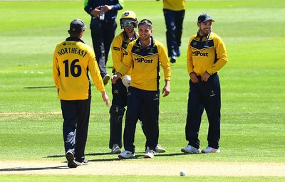 100822 - Glamorgan v Yorkshire - Royal London One-Day Cup - Kiran Carlson of Glamorgan celebrates the wicket of George Hill of Yorkshire