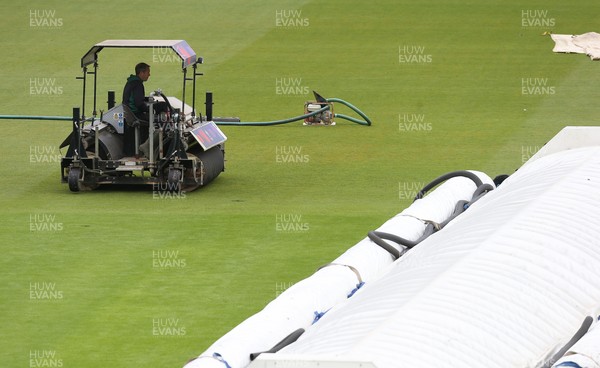 150521 - Glamorgan v Yorkshire, LV= County Championship Group Three - Ground staff continue to work on the pitch ahead of an announcement of a start to the day's play