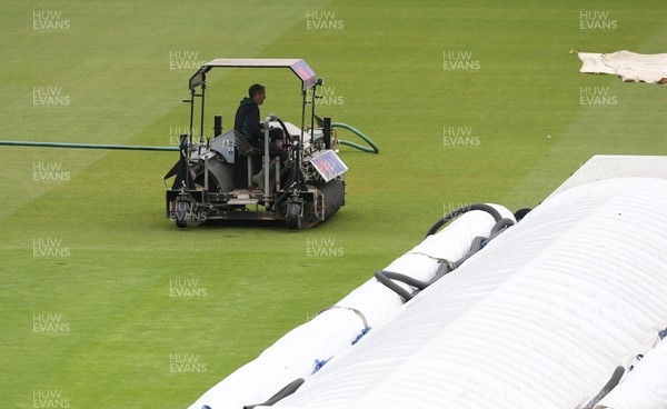 150521 - Glamorgan v Yorkshire, LV= County Championship Group Three - Ground staff continue to work on the pitch ahead of an announcement of a start to the day's play