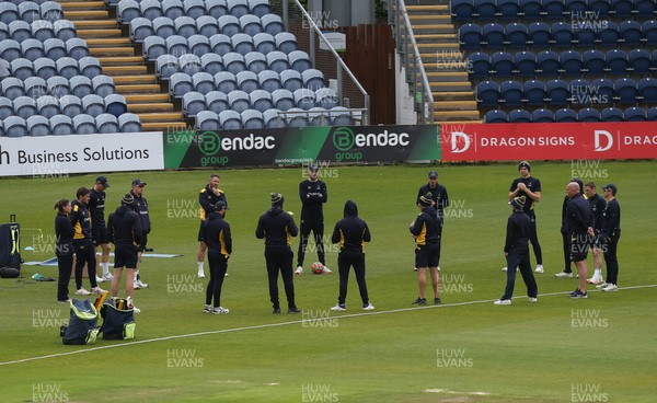 150521 - Glamorgan v Yorkshire, LV= County Championship Group Three - Glamorgan players group together ahead of the day's play as the umpires walk out to inspect the wicket
