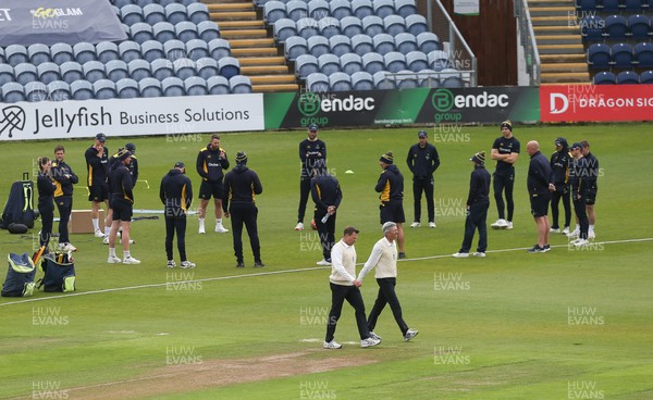 150521 - Glamorgan v Yorkshire, LV= County Championship Group Three - Glamorgan players group together ahead of the day's play as the umpires walk out to inspect the wicket