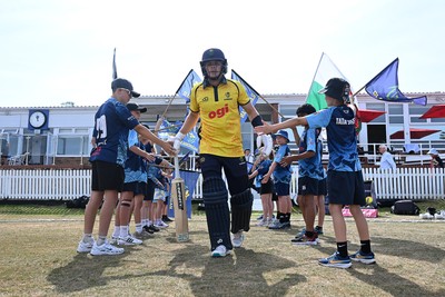 240726 - Glamorgan v Yorkshire - Metro Bank One Day Cup Men - Callum Nicholls of Glamorgan runs out at the start of the match