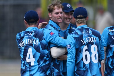 240726 - Glamorgan v Yorkshire - Metro Bank One Day Cup Men - Ben Cliff of Yorkshire celebrates with team mates after Will Smale of Glamorgan is LBW