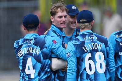 240726 - Glamorgan v Yorkshire - Metro Bank One Day Cup Men - Ben Cliff of Yorkshire celebrates with team mates after Will Smale of Glamorgan is LBW