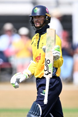 240726 - Glamorgan v Yorkshire - Metro Bank One Day Cup Men - Eddie Byrom of Glamorgan hits the ball for six runs to get his 50